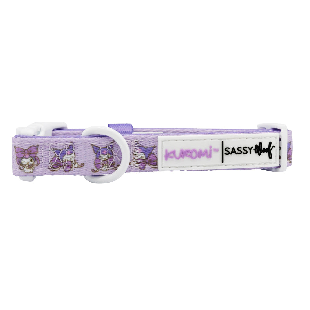 The Sassy Woof Dog Four Piece Bundle - Kuromi™ includes a lavender collar with Kuromi designs, a white buckle, and tag—perfect for fans of Kuromi or Hello Kitty dog accessories.