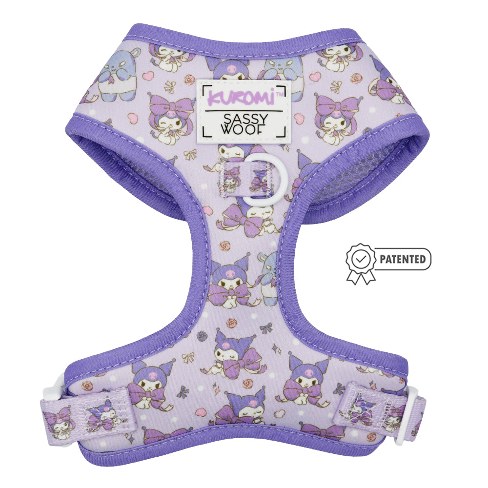 The Sassy Woof Dog Two Piece Bundle - Kuromi™ features a purple harness with cartoon Kuromi characters, hearts, bows, "Kuromi" and "Sassy Woof" text, adjustable straps, and a signature badge for comfort and style.