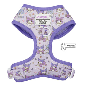 The Sassy Woof Dog Two Piece Bundle - Kuromi™ features a purple harness with cartoon Kuromi characters, hearts, bows, "Kuromi" and "Sassy Woof" text, adjustable straps, and a signature badge for comfort and style.