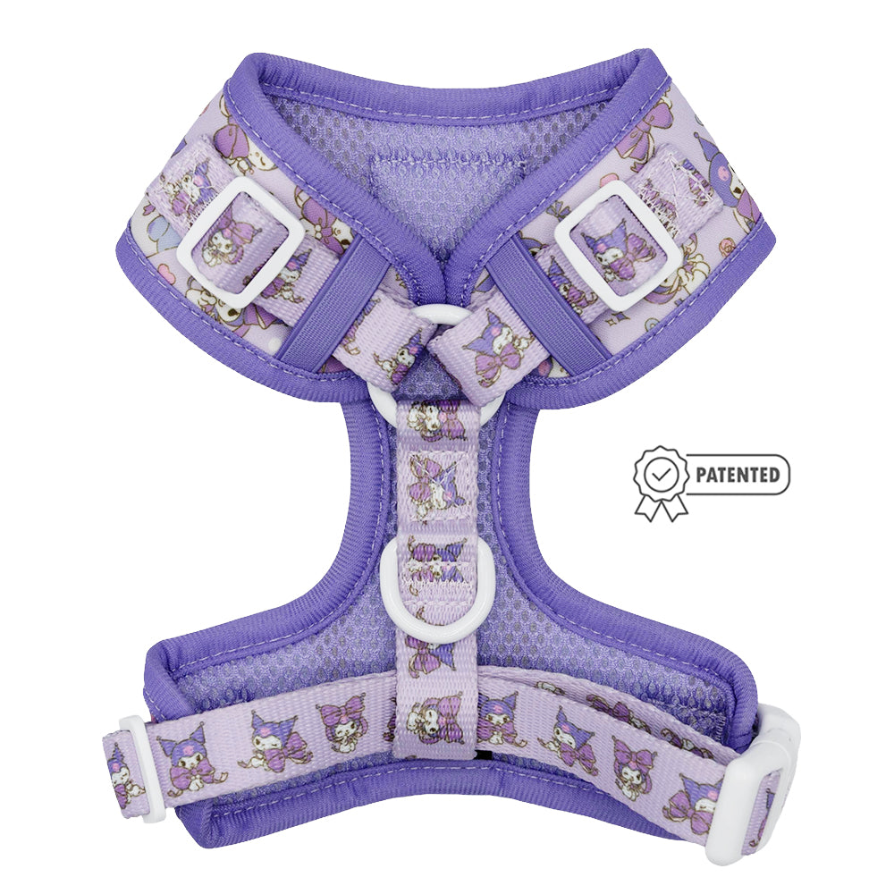 The Sassy Woof Dog Adjustable Harness - Kuromi™ features a purple design with white buckles, playful cartoon patterns, and a patented badge icon. Ideal as a Hello Kitty dog harness for fun-loving pets. Shown on a plain white background.
