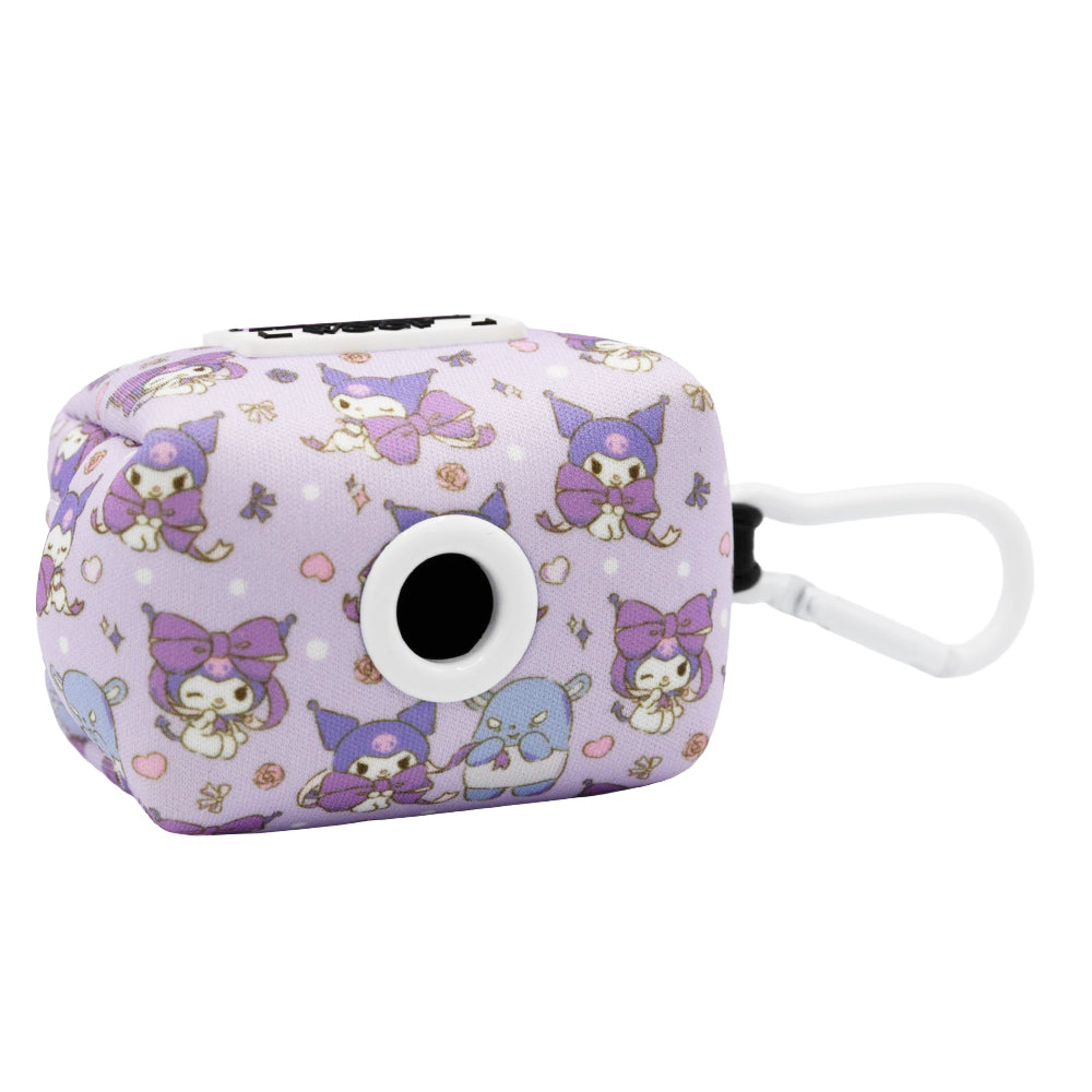 A small, rectangular Dog Four Piece Bundle - Kuromi™ case by Sassy Woof with a white clip and purple pattern featuring cartoon characters, including skulls and bows. It has a circular opening on one side—ideal for Hello Kitty fans.