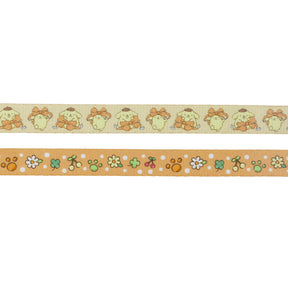 The Dog Two Piece Bundle - Pompompurin™ by Sassy Woof includes two decorative tapes: one with repeating cartoon dogs with orange bows, and another with flowers, paw prints, and dots on an orange background.