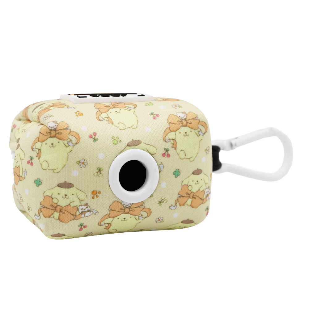 The Sassy Woof Collar Three Piece Bundle - Pompompurin™ features a light yellow square pouch with cute Pompompurin dog prints, a black circular opening, and a white clip—perfect for pairing with your other Pompompurin pet accessories.