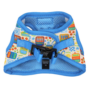 The Sassy Woof Cat Step-In Harness - Portofino features a playful sardine can, fish, and kitchen pattern with blue trim, black buckle, and breathable mesh lining. Part of the Portofino Cat Collection. Size XS.