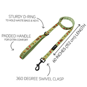 The Sassy Woof Dog Leash - Feeling Vine features a green, plant-inspired design with cartoon print, comfy neoprene handle, sturdy D-ring for bags or keys, 360° swivel clasp, and is 60" (152 cm) long—labeled with arrows.