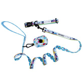 Add fun Sanrio style to walks with the Sassy Woof Collar Three Piece Bundle - Hello Kitty® & Friends In the Sky. This set includes a blue leash handle, adjustable Hello Kitty collar, and matching waste bag holder with playful cartoon prints.