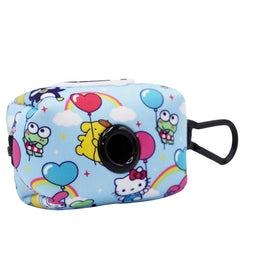 The Sassy Woof Dog Waste Bag Holder – Hello Kitty® & Friends In the Sky features a light blue pouch with colorful cartoon designs, a black circular dispenser, and clip—perfect for adding playful Sanrio style to your pet’s walks.