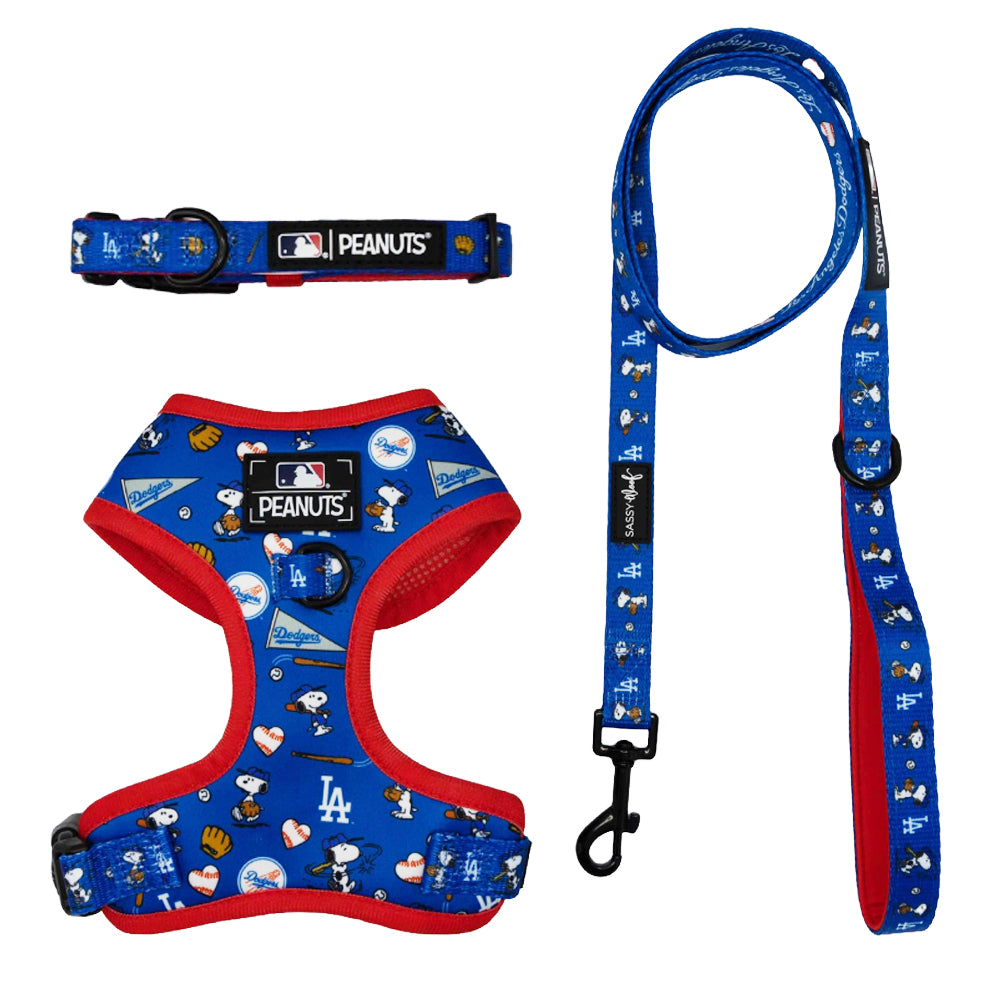 The Sassy Woof Harness Three Piece Bundle – MLB x Peanuts™ Los Angeles Dodgers™ features Snoopy, team logos, and more. Includes harness, collar & leash—ideal for stylish fans and pups needing a growth protection plan.