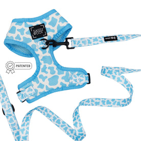 The Sassy Woof Dog Two Piece Bundle - Blueberry Milk features a stylish blue and white adjustable harness with a matching leash for your pup’s comfort and style.