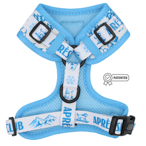 Introducing the Dog Adjustable Harness - Après Ski Club by Sassy Woof, a light blue and white custom printed neoprene harness adorned with snowy mountain, snowflake, and dog graphics. Featuring “APRÈS CLUB” on the straps and a patented badge on the side, this stylish adjustable harness offers both comfort and flair for your adventurous pup.