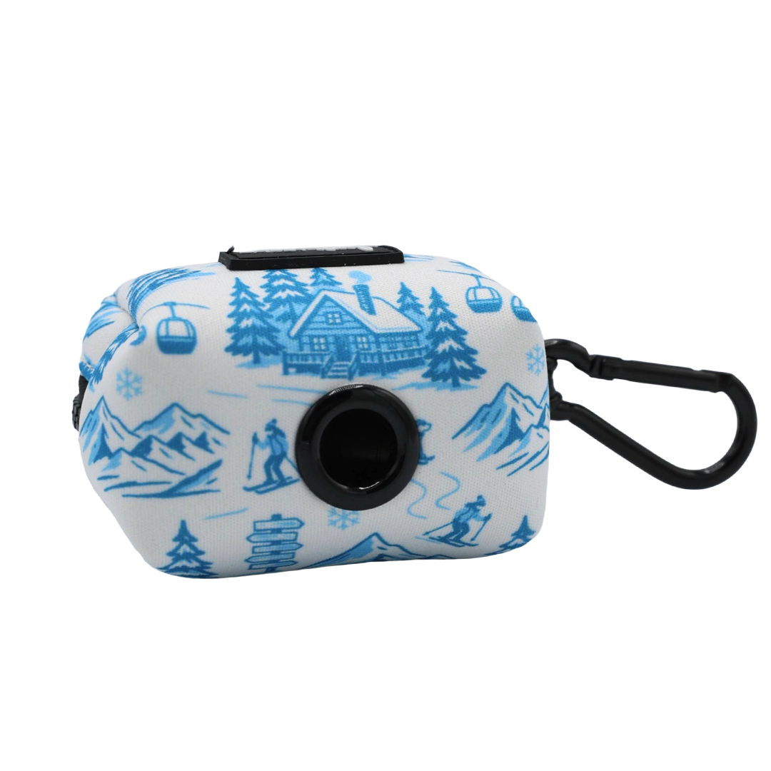 Add a touch of winter style to your pup’s walks with the Sassy Woof Dog Collar Three Piece Bundle - Après Ski Club. This small pouch features a black dispenser hole and clip, and is beautifully decorated with blue winter mountain scenes, trees, skiers, ski lifts, and a cozy cabin on a white background—an ideal match for your favorite dog collar as part of the Après Ski Club accessory collection.