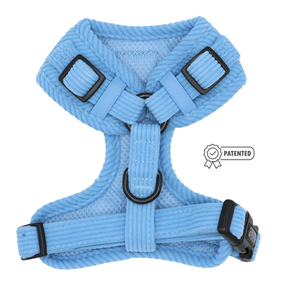 Sassy Woof Dog Adjustable Harness - Morning Frost in light blue, featuring a no-pull design, black buckles, hardware, and a small patented seal icon on the side.
