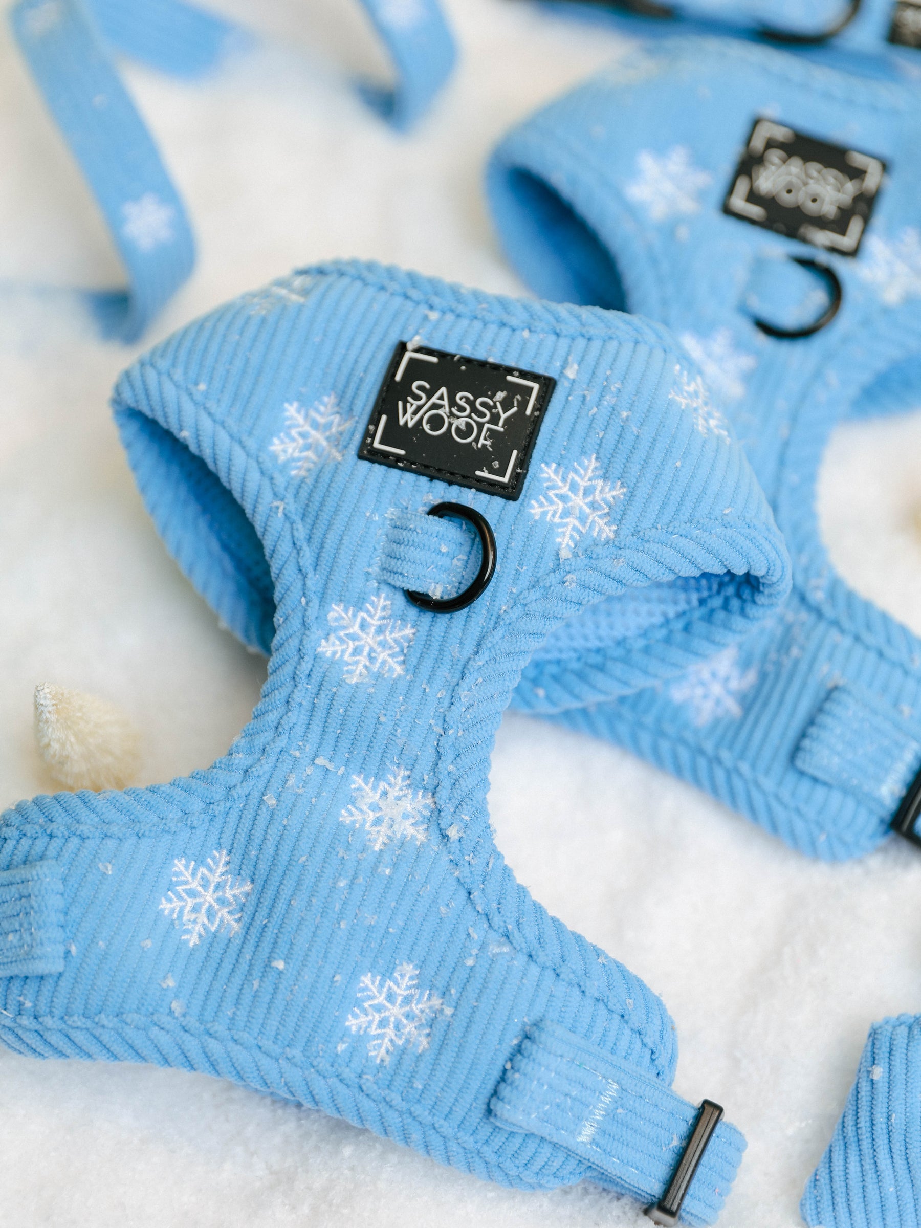 Two Sassy Woof Dog Two Piece Bundle - Morning Frost harnesses in light blue with white snowflake patterns and black hardware.