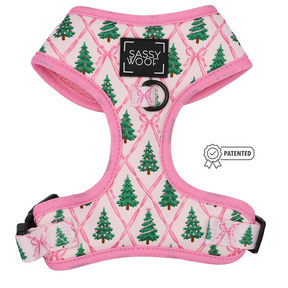 The Sassy Woof Dog Four Piece Bundle - Pretty in Pine showcases a festive Christmas tree design, complete with a black Sassy Woof label and matching black buckle. Ideal for winter dog accessory lovers, its patented badge is visibly placed on the right side of the image.