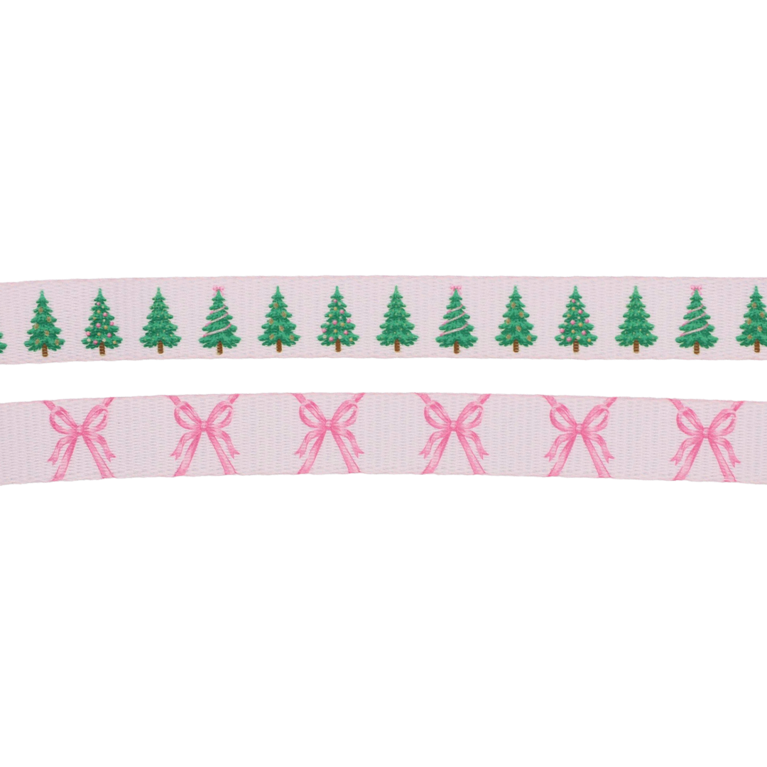 Two horizontal strips of ribbon: the top features repeating green Christmas trees, inspired by the Sassy Woof Dog Four Piece Bundle - Pretty in Pine, while the bottom displays repeating pink bows. Both ribbons have a light background, making them charming choices for winter dog accessories or an adjustable dog collar.