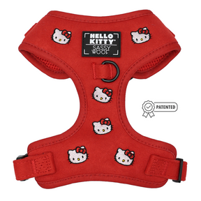 Red Sassy Woof Dog Adjustable Harness - Hello Kitty® Chic featuring an all-over character pattern, a central logo patch, and a patented seal icon.