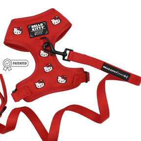 Red Sassy Woof Dog Two Piece Bundle - Hello Kitty® Chic harness and matching leash patterned with cartoon faces, featuring a patented product label.