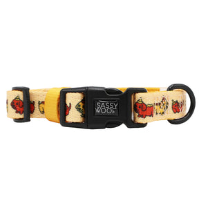 The Dog Collar - Hot Dawg by Sassy Woof features a beige design with cartoon red dogs, an adjustable fit, a black plastic Sassy Woof buckle, and a black D-ring—ideal as a dachshund collar!.
