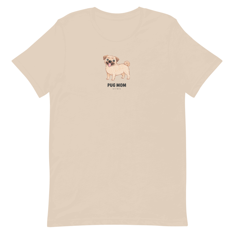 The Sassy Woof Pug Mom Tee is a unisex beige shirt featuring a small tan pug with sunglasses and "Pug Mom" in black on the chest—perfect for any dog lover.