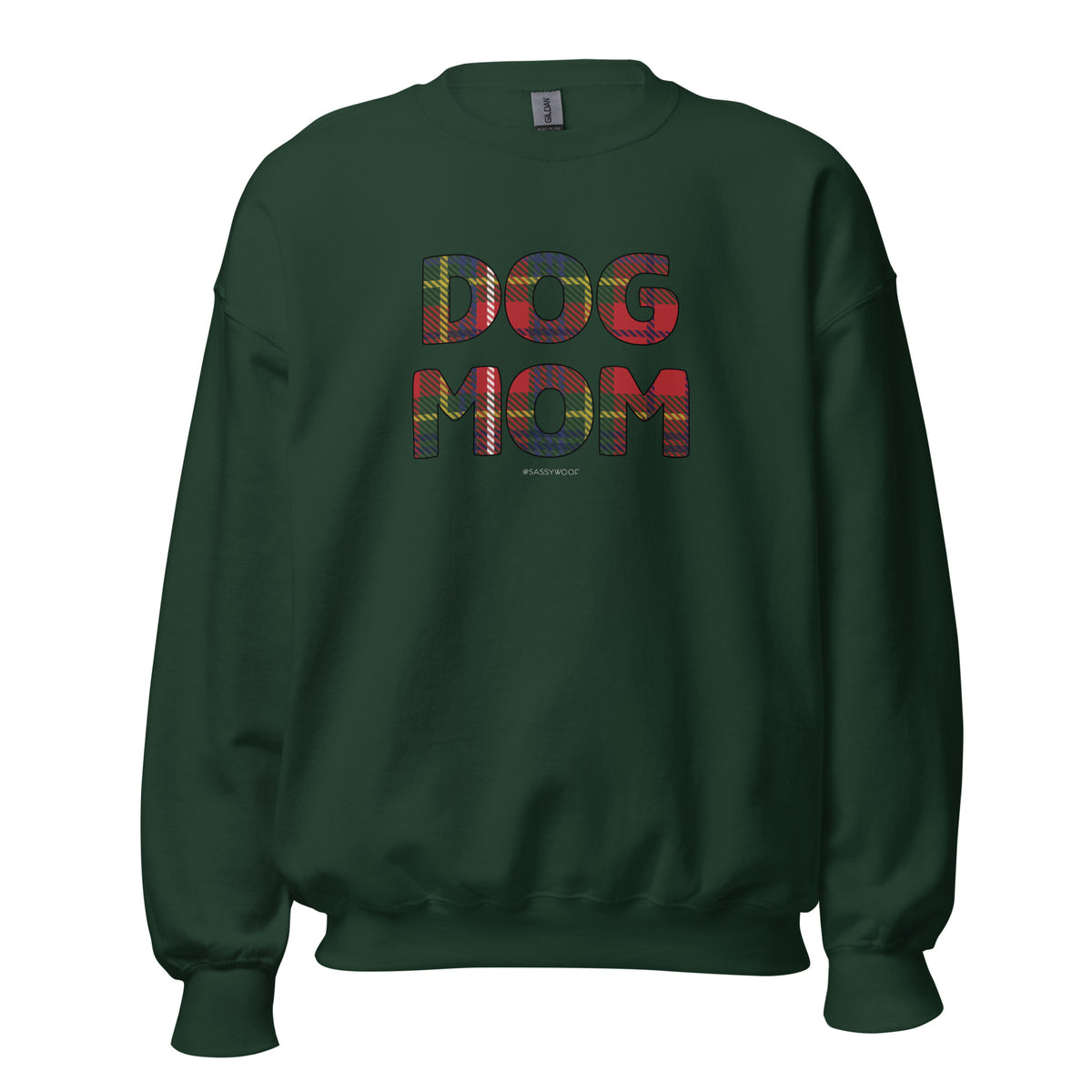 The Sassy Woof "Sweatshirt Dog Mom Deck the Paws" is a dark green, pre-shrunk classic fit sweater featuring large multicolored plaid DOG MOM letters and #SELFYCOZY below in small white text, blending style with comfort.