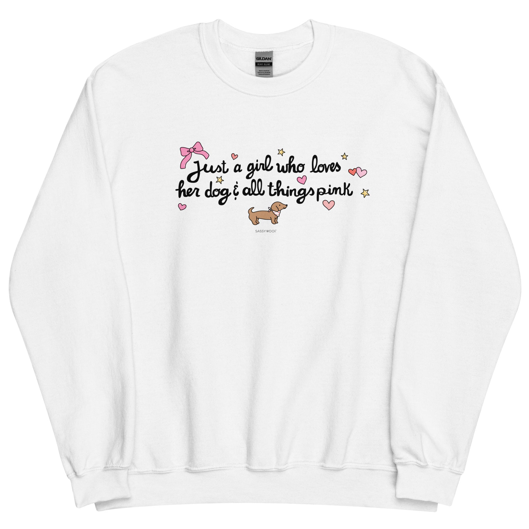 The Sassy Woof "Sweatshirt - Just A Girl" is a white, pre-shrunk classic fit sweater with "Just a girl who loves her dog & all things pink," pink hearts, a bow, yellow stars, and a dachshund—perfect for dog lovers.
