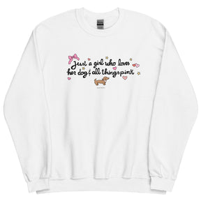 The Sassy Woof "Sweatshirt - Just A Girl" is a white, pre-shrunk classic fit sweater with "Just a girl who loves her dog & all things pink," pink hearts, a bow, yellow stars, and a dachshund—perfect for dog lovers.