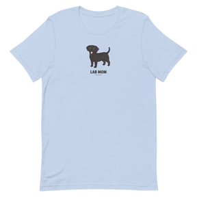 The Sassy Woof Lab Mom Tee is a light blue unisex shirt showcasing a cartoon black Labrador and “LAB MOM” text—perfect for proud Lab moms.