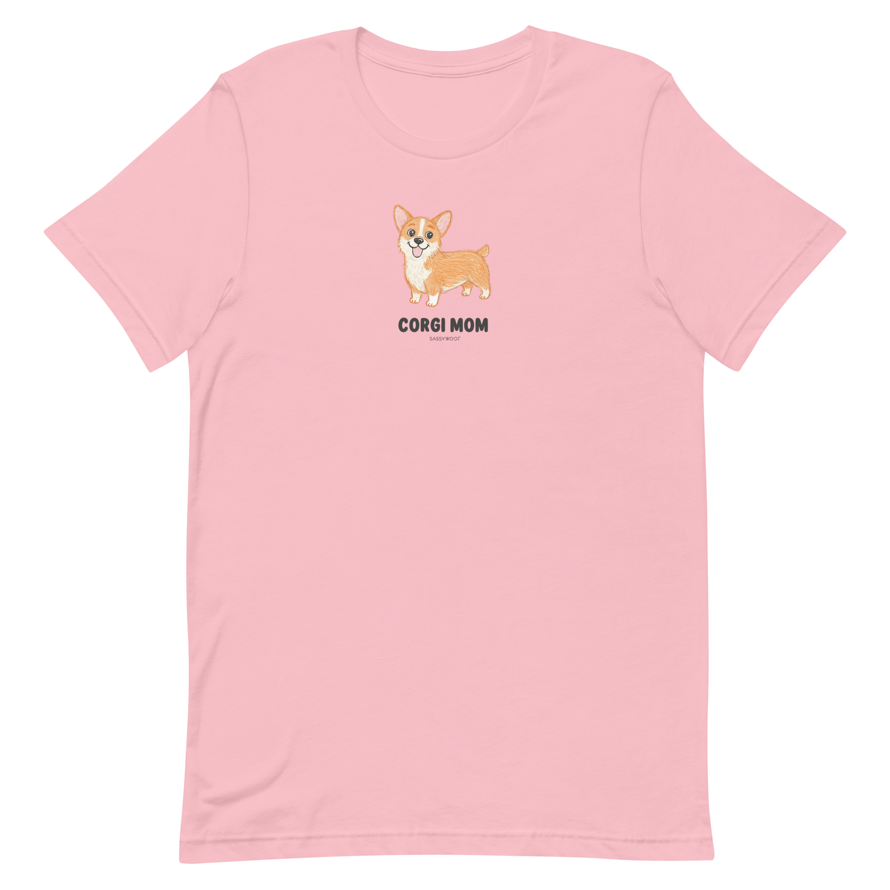 Sassy Woof's Corgi Mom Tee is a light pink shirt featuring a cute cartoon corgi with "CORGI MOM" text centered below the illustration—a perfect choice for fans of this adorable breed.