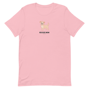 The Sassy Woof Rescue Mom Tee is a pink unisex cotton shirt with a cute cartoon dog, perfect for proud pet parents and breed lovers.