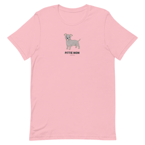 The Pittie Mom Tee by Sassy Woof is a light pink unisex shirt with a cute gray pit bull and bold "Pittie Mom" text centered on the chest—perfect for proud pitbull moms and dog lovers.