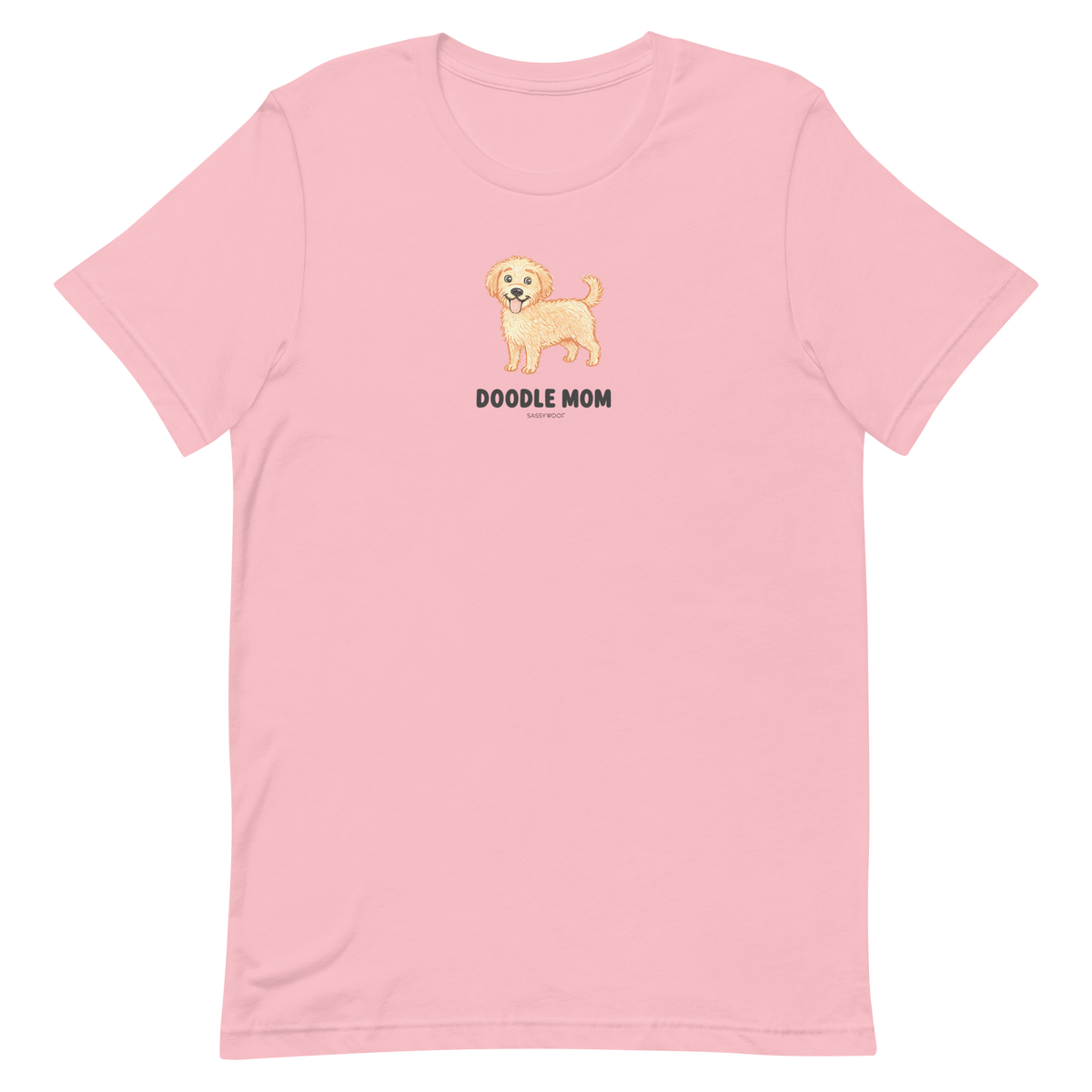 The Sassy Woof Doodle Mom Tee is a light pink unisex shirt with a smiling doodle dog graphic and bold “DOODLE MOM” text—perfect for any proud Doodle Mom.