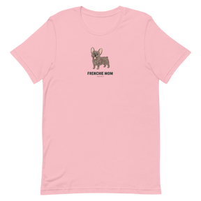 The Sassy Woof Frenchie Mom Tee is a light pink shirt with a cartoon French Bulldog and bold, centered "FRENCHIE MOM" text on the chest.