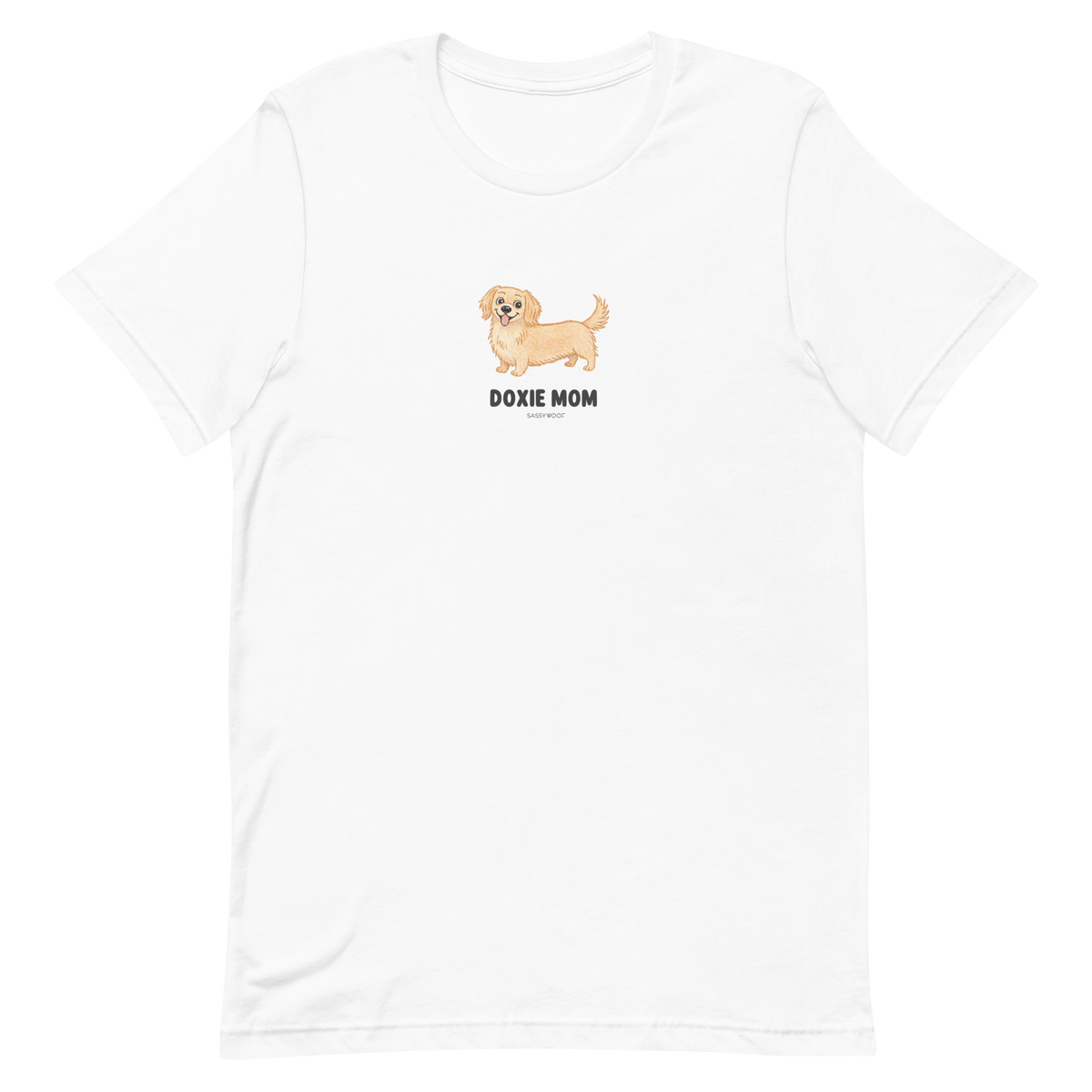 The Sassy Woof Doxie Mom Tee features a cartoon tan dachshund above bold black text, centered on the chest. This unisex shirt is perfect for dachshund moms who want to show their love for their favorite breed in style.