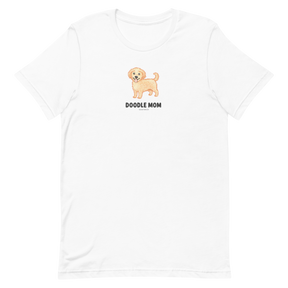 The Sassy Woof Doodle Mom Tee is a white unisex shirt featuring a cartoon doodle dog and "DOODLE MOM"—perfect for any proud Doodle Mom t-shirt collector.