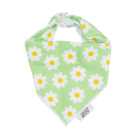 The Sassy Woof Dog Bandana - Daisy features a light green mesh fabric with a white daisy and yellow center pattern, knot tie at the top, and a “Sassy Woof” label on the side.