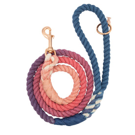 The Sassy Woof Dog Rope Leash - Aloha is a hand-crafted, thick cotton leash in ombre cream, pink, purple, and blue shades, finished with a gold metal clasp and ring.