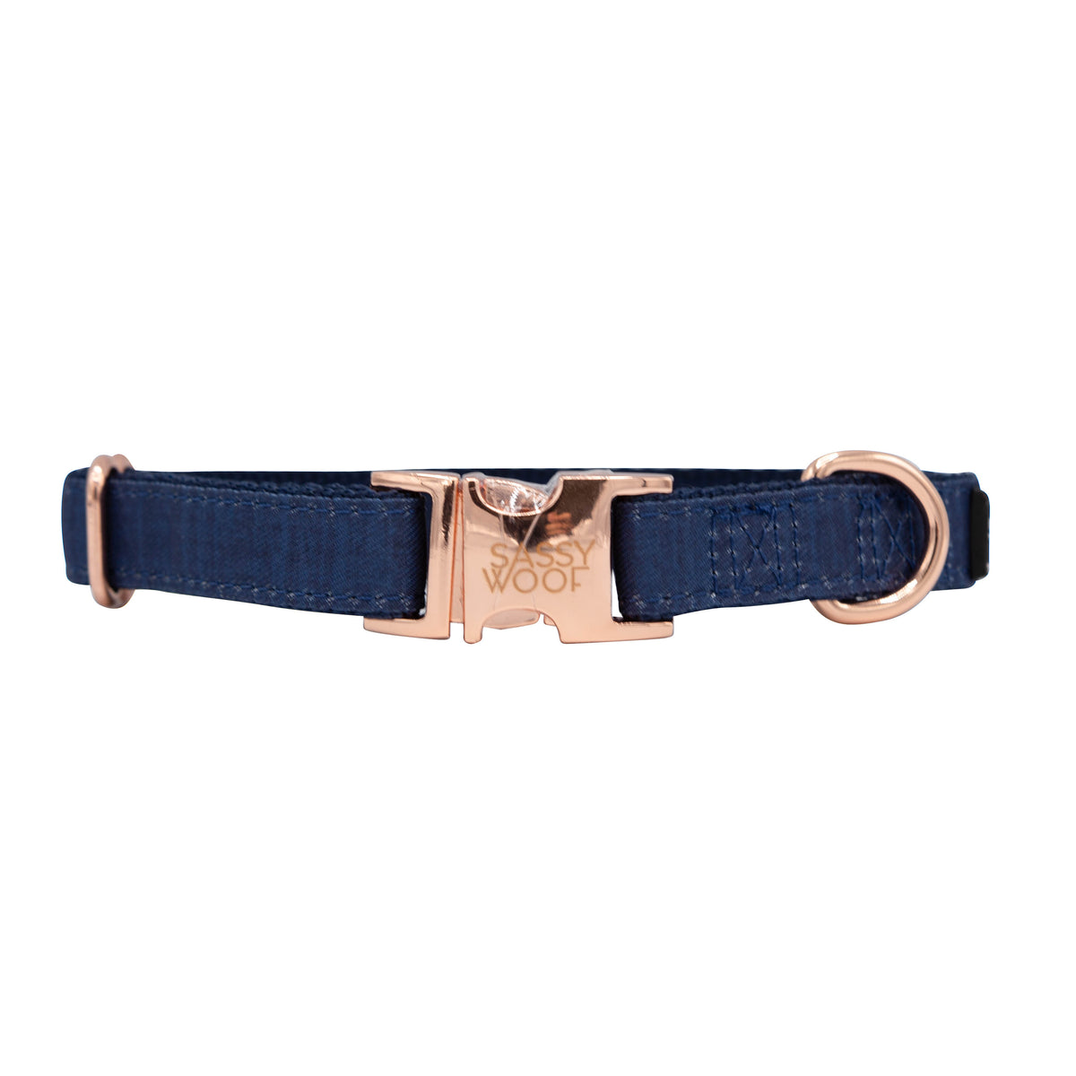 The Sassy Woof Dog Collar - Twilight features a blue design, gold buckle, and an adjustable fit for comfort.