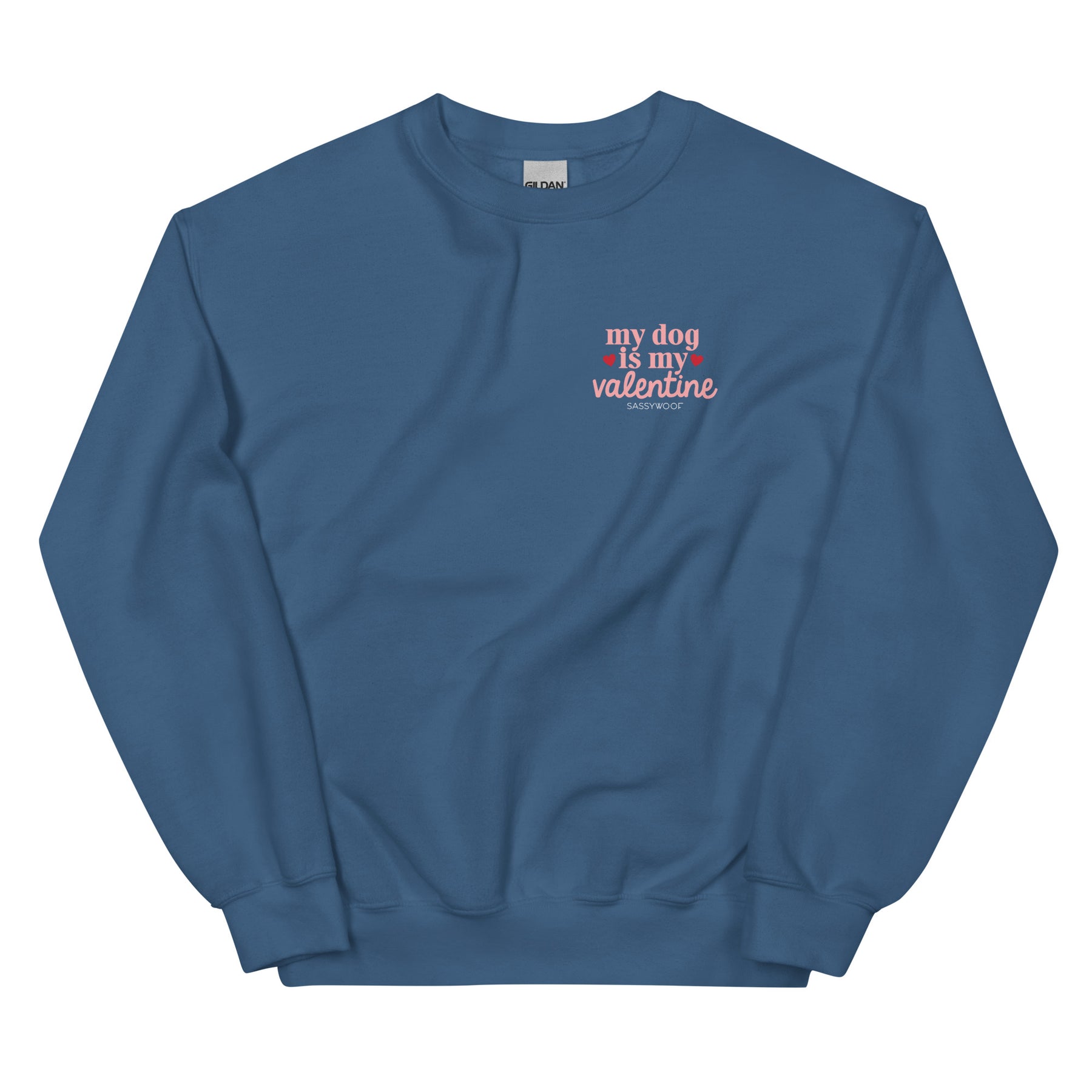 The Sassy Woof "My Dog is My Valentine (Dark)" sweatshirt is a blue crewneck with small pink chest text and hearts—the perfect Valentine's Day sweatshirt for dog lovers.