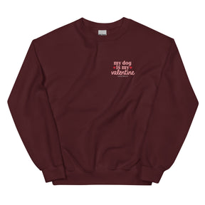 The Sassy Woof "Sweatshirt - My Dog is My Valentine (Dark)" features white and pink text with small pink hearts on maroon—perfect for any dog lover looking to celebrate Valentine’s Day in style.
