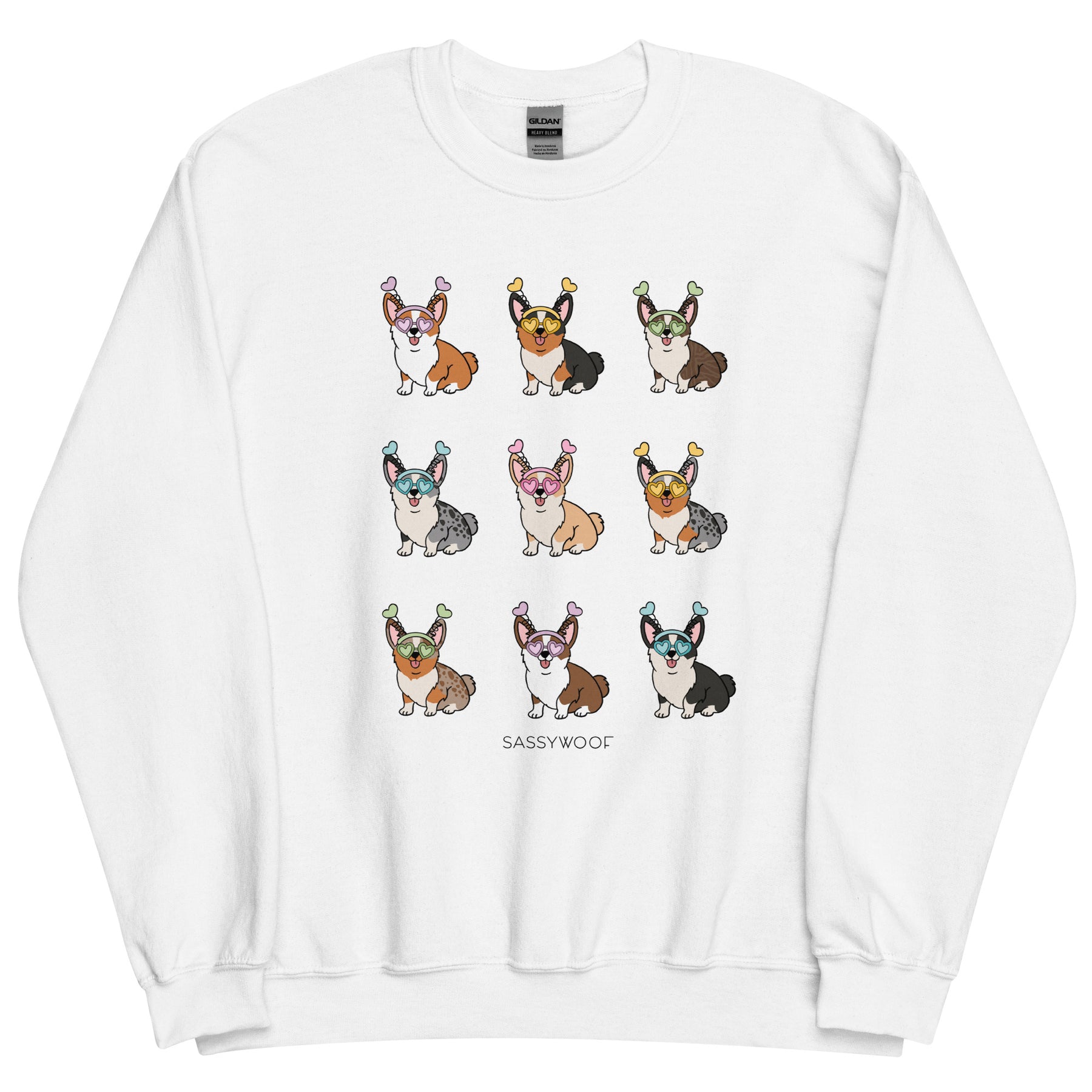The Sweatshirt - Valentine's Corgis by Sassy Woof features a grid of nine corgis in colorful antenna headbands with different fur patterns—perfect for dog lovers. "SASSYWOOF" is printed beneath the cute illustrations.