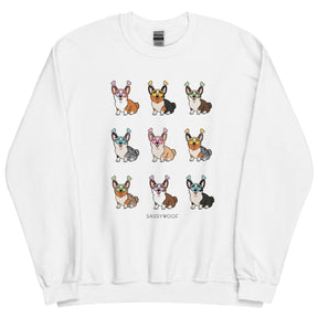The Sweatshirt - Valentine's Corgis by Sassy Woof features a grid of nine corgis in colorful antenna headbands with different fur patterns—perfect for dog lovers. "SASSYWOOF" is printed beneath the cute illustrations.